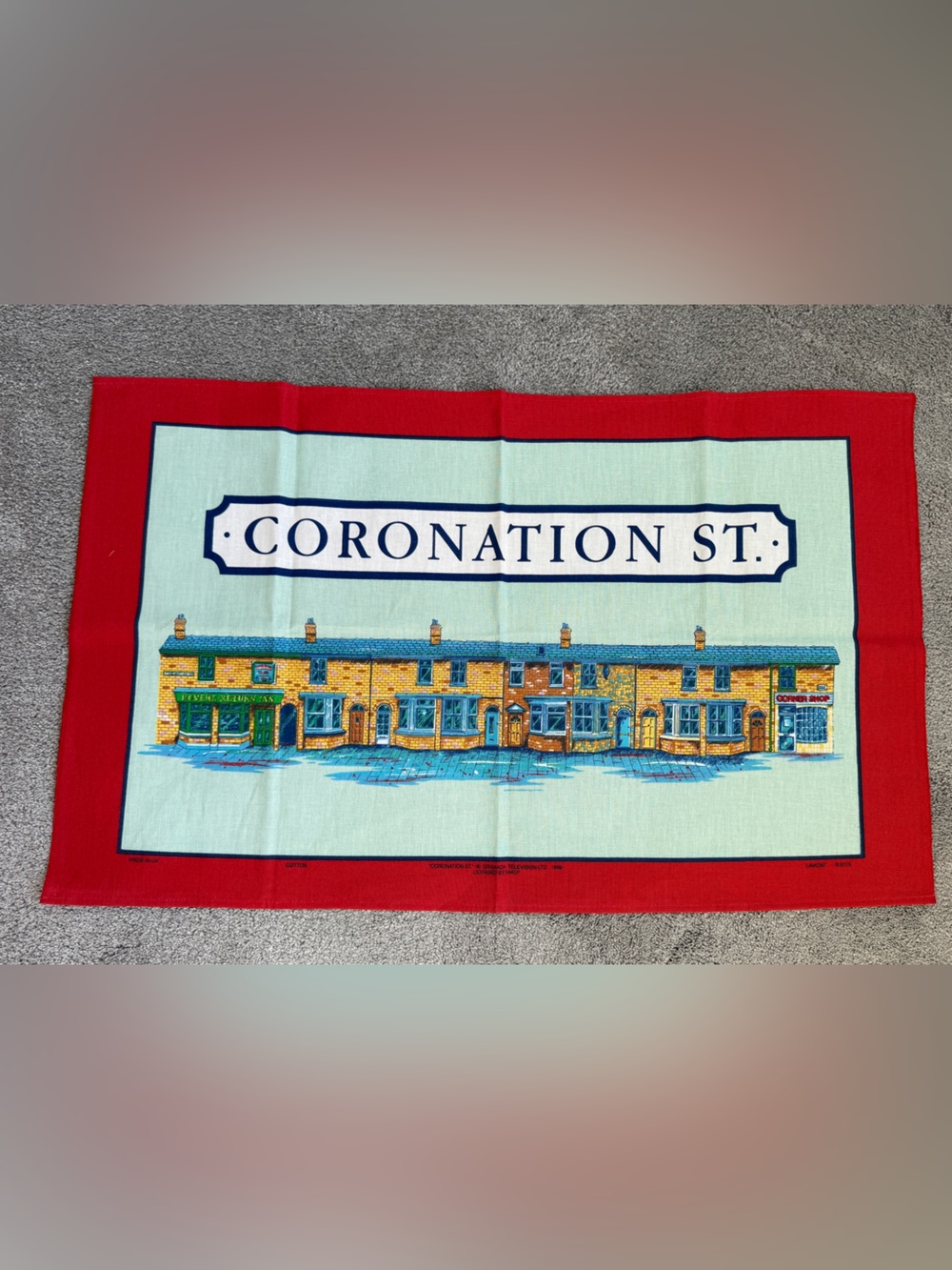 Vintage souvenir Coronation Street tea towel
Cotton